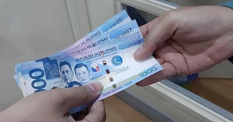 Peso sinks to new low as market climbs past 6,000