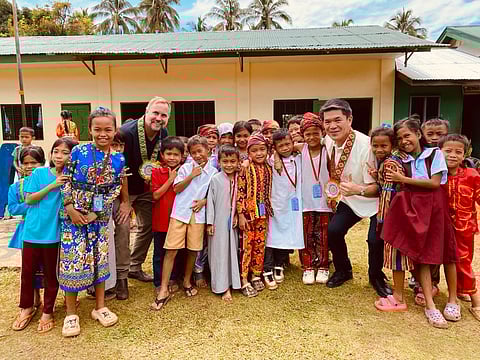 JAPANESE Ambassador Endo Kazuya (fifth from right), joined by WFP Philippines Country Director Regis Chapman, visits a school feeding site in Upi, Maguindanao del Norte. The ambassador took part in preparing and serving meals alongside parents and volunteers — showing Japan’s continued support for nutrition, education and community empowerment in BARMM.