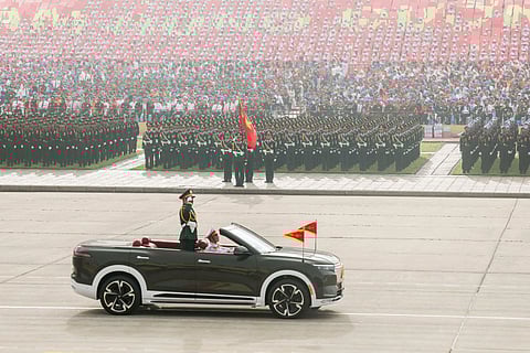 AN OPEN-TOP VinFast VF 9 carries officials across the parade ground during Vietnam’s 80th National Day.
