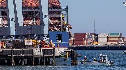 STACKS of containers are leaning precariously from the Portugal-registered ship Mississippi Madera at the Port of Long Beach on 9 September 2025 in Long Beach, California.