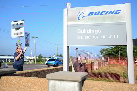 Boeing defense plant workers strike outside of a Boeing facility on August 5, 2025 in Berkeley, Missouri. Members of the International Association of Machinists (IAM) voted to authorize a strike at three defense plants after rejecting a tentative agreement that would have given many of the members raises of 40% over the four-year life of the contract.