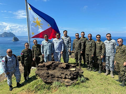 Rallying Under the Flag: Army Chief Lt. Gen. Antonio G. Nafarrete, AFP Northern Luzon Command (NOLCOM) Commander Lt. Gen. Fernyl G. Buca, and AFP Western Command (WESCOM) Commander Rear Admiral Alfonso F. Torres gather for a group photo during their visit at the Naval Detachment on Mavulis Island in Batanes on September 10, 2025.⁩⁩ 