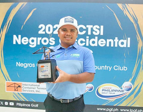 RUPERT Zaragosa shows off his trophy after winning the 2025 ICTSI Negros Occidental Classic in Bacolod on Friday.