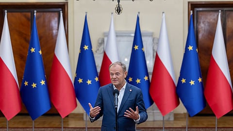 Poland's Prime Ministrer Donald Tusk arrives to address the late evening press conference in the government building after he attended in the National Security Council convened by Poland's President at the Presidential Palace in Warsaw on September 11, 2025, a day after Warsaw accused Moscow of carrying out a drone raid on its territory. France and Germany moved to bolster defence of Polish airspace on September 11 as the UN Security Council called an emergency meeting to discuss Warsaw's accusation that Moscow launched a drone raid on its territory. Poland branded the incident, which prompted Polish and NATO forces to shoot down several drones overnight Tuesday to Wednesday, September 9-10, a deliberate "unprecedented" attack on the country, NATO and the European Union.
