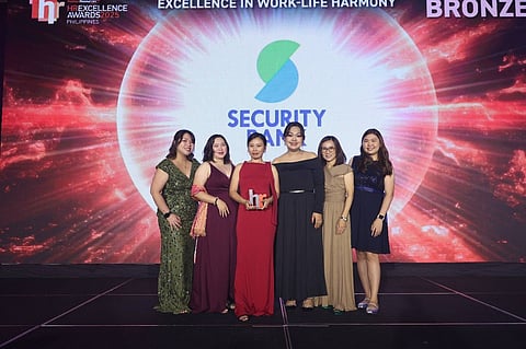 Security Bank’s HCM team at the HR Excellence Awards on 7 August, 2025, where they won Excellence in Work-Life Harmony (Bronze) for operationalizing the “You matter” Employee Value Proposition. Pictured (L-R): Megan Fuentes, SM and Wellness Head; Karen Santos, Wellness Programs Officer; Melissa Dayson, Wellness Programs Officer; Karen Pasco, VP and Employee Relations, Wellness & Experience Head; and Cy Jarin, Wellness Programs Officer.