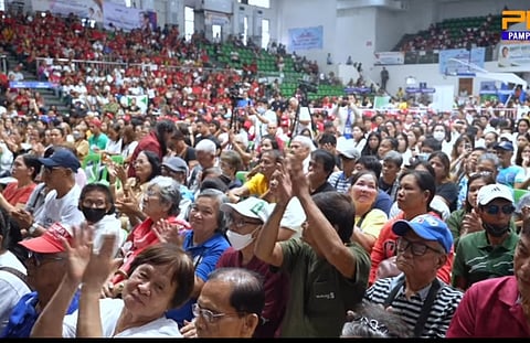 HOPEFUL FACES | Beneficiaries from across Pampanga attend the "Handog ng Pangulo" event, receiving vital services and support to boost their livelihoods. | Franco Regala