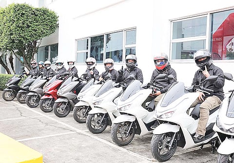 MEDIA riders and moto vloggers pose with their Honda PCX160 scooters at the starting point of the PCXceptional Ride, ready for a full day on the road.
