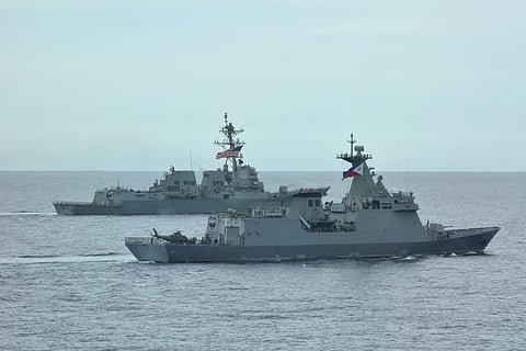 The USS John Finn (DDG113) sails in close coordination with BRP Jose Rizal (FF150) during the 11th Multilateral Maritime Cooperative Activity.
