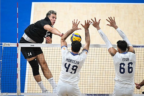 Seif Abed of Egypt challenges the two-man wall of Sharifi Morteza and Seyed Eisa of Iran during their 2025 FIVB Volleyball Men’s World Championship Pool A clash. The Pharaohs won in four sets, 25-17, 16-25, 25-23, 25-20.