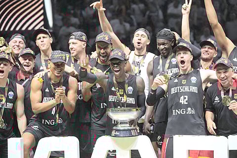 DENNIS Schroder savors the sweetness of victory after helping Germany beat Turkey, 88-83, to win the Euro Basket title in Riga, Latvia.    