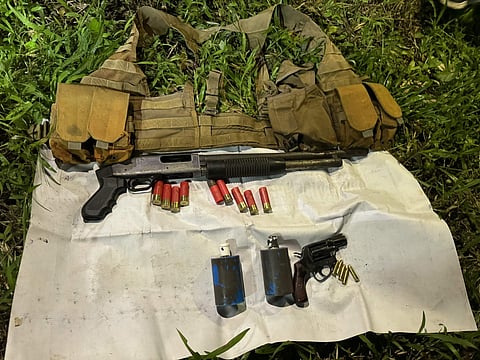 Some of the firearms Ka Arthur turned over to the Daet Municipal Police Station after surrendering in the town of Labo, Camarines Norte on September 14, 2025.