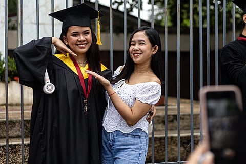 College students, joined by their proud parents, celebrate their graduation day at the Polytechnic University of the Philippines in Sta. Mesa, Manila, on Tuesday, 16 September 2025.