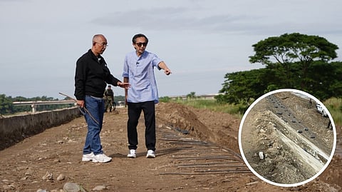 PUBLIC Works Secretary Vince Dizon (right) and Baguio City Mayor Benjamin Magalong inspect a flood control project in Bauang, La Union, highlighting efforts to ensure proper implementation and address concerns over substandard infrastructure.