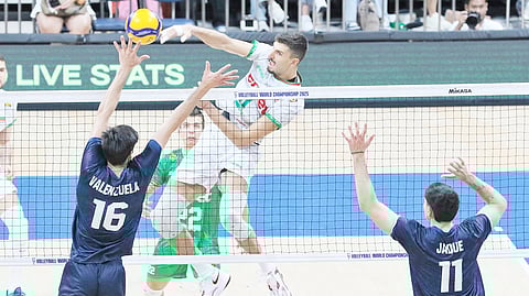ALEKS Grozdanov soars for a powerful attack to lift Bulgaria to a dominant 25-17, 25-12, 25-17 win over Chile in the preliminaries of the FIVB Volleyball Men’s World Championship.   
