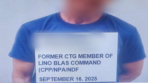 ARMS DOWN | "Alias 'Ka Gelo,' 60, former commander of the New People’s Army’s Lino Blas Command (LBC), surrenders to police in Orani, Bataan, on September 16. The ex-rebel turned over a .38 revolver, grenade, and ammunition as part of the government’s intensified peace drive under the NTF-ELCAC program.| Franco Regala
