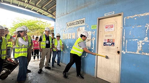 Officials from the Department of Transportation lead the demolition of the old Philippine National Railways stations to accelerate the construction of the Manila-Laguna segment of the North-South Commuter Railway.