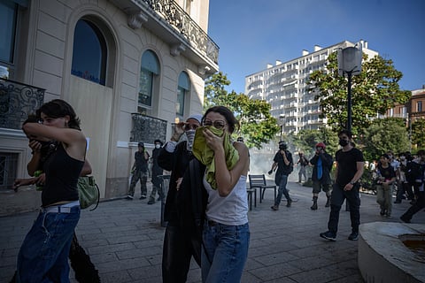 Mass rallies, disruptions in France on day of anger against Macron