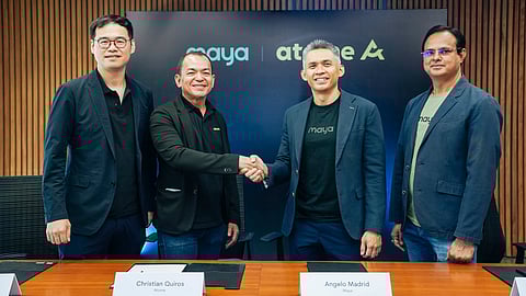 ATOME Philippines Country General Manager Christian Quiros (second from left) shakes hands with Maya Bank president Angelo Madrid (third from left) to mark a P2.75-billion loan channeling partnership in Manila, joined by Atome Financial CEO Jefferson Chen (left) and Maya Bank COO Manu Panda (right).