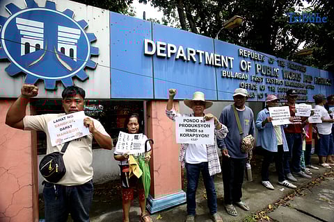 (September 19 2025) A black Friday protest farmers of the Nagkakaisang Magbubukid ng Malolos (NMM), students from the Bulacan State University and the Kilusang Magbubukid ng Pilipinas (KMP) trooped to the DPWH Bulacan office in Malolos City to stage a protest against corruption and squandering of billions in flood control budget at the expense of farmers who are always suffering from flooding and calamities, and to demand accountability from officials and contractors sinking deep in greed. Photo/Analy Labor
