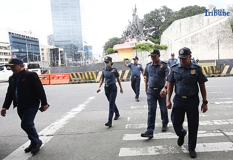 On Saturday September 20 2025, Officials from Quezon City Police District QCPD conduct a walk through at Edsa People Power Monument in preparation for the anti corruption rally on September 21 2025. 
