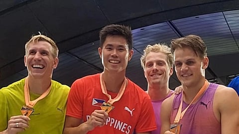 ERNEST John Obiena (center) shares his victory with fellow competitors Thibaut Collet of France, Piotr Lisek of Poland and Ben Broeders of Belgium in the Atletang Ayala World Pole Vault Challenge on Sunday at the Ayala Triangle in Makati City.
