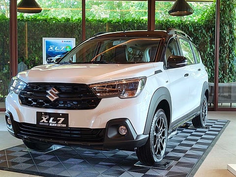 THE front view of the XL7 Hybrid Black Edition with its new dark grille and accents.