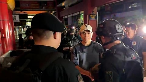Manila City Mayor Isko Moreno inspecting the damages of a hotel entrance