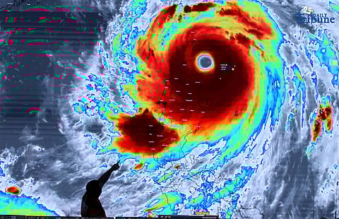 China prepares to evacuate 400,000 as super typhoon makes landfall in Philippines