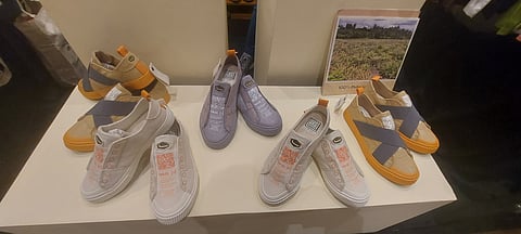 Sneakers made from upcycled pineapple leaves, designed in collaboration with Manila-based Japanese artist Wataru Sakuma.