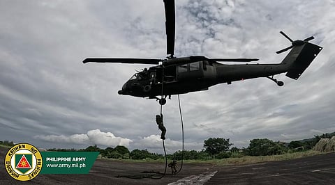 
Philippine Army and Philippine Air Force teams perform Fast Rope Insertion Extrication System during the week-long 4th PA-PAF Interoperability Exercise in Legazpi City, Albay.
