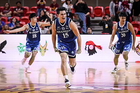 Ray Allen Torres celebrates after draining the game-winning trey to lift Adamson past UP, 62-59, in the UAAP Season 88 men's basketball tournament.