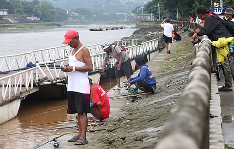 People were seen fishing along the Marikina River at Marikina River Park on Friday, September 26, 2025, as Typhoon Opong weakened into a severe tropical storm.

Opong, previously classified as a typhoon, was downgraded by PAGASA, which warned the public to remain on alert for possible hazards, including floods, landslides, and storm surges.