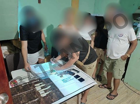 Mariveles Police conduct inventory on the confiscated loose firearm and shabu worth P98,000 in De Guzman Blvd., Brgy. Poblacion, Mariveles from the two suspects.