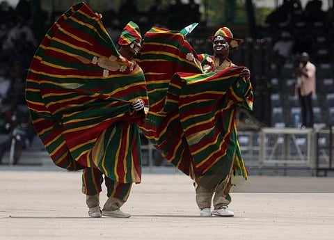 Members of Adila Acrobatic Display Band showcase the vibrance of the culture at the Eagles Square in Abuja, Nigeria during their 61st Independence Celebration on 1 October 2021.