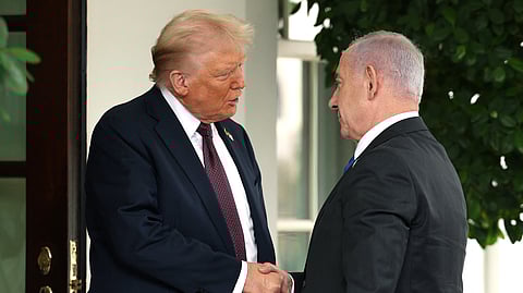 US President Donald Trump (left) greets Israeli Prime Minister Benjamin Netanyahu as he arrives at the White House on 29 September 2025 in Washington, D.C. 