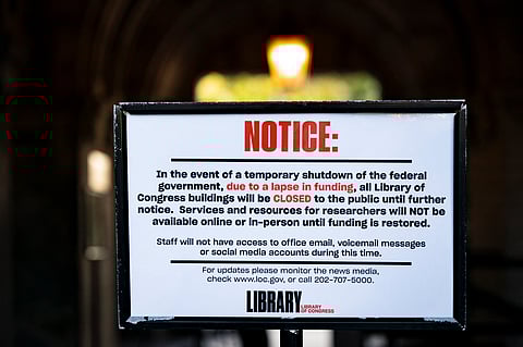 A sign indicating that the Library of Congress is closed due to the government shutdown, on October 1, 2025 in Washington, DC. Congress could not agree on a budget to fund government at midnight, causing the first shutdown since 2018