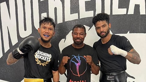 
Tokyo Olympics bronze medalist Eumir Marcial (left) gets quality sparring from Shane Mosley Jr. (right) while father Shane Sr. looks on in Las Vegas.