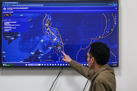 Metro on tenterhooks Christian John Evangelista, chief of research and planning of the Manila Disaster Risk Reduction and Management Office, traces the fault lines and trenches running beneath the archipelago on 2 October 2025 — days after a 6.9-magnitude quake rattled Bogo City, Cebu, and reminded the nation of its fragile ground.