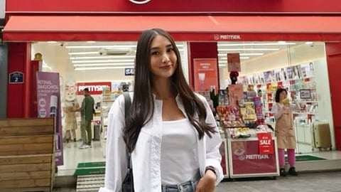 Katrina Santos, the daughter of Catherine Gamos.