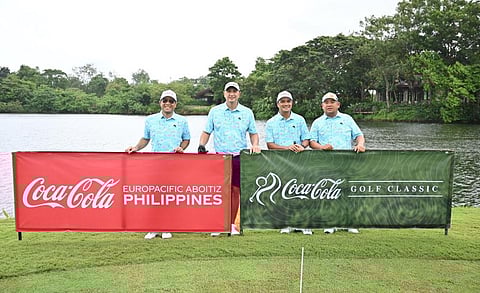 
JAYE Escuadro, Jose Juanchit, Eric Gozo, and Erik Escalona from The Turf Company smile after emerging with a gross winning score of 59 to rule the Coca-Cola Golf Classic last week at the Sta. Elena Golf and Country Club in Sta. Rosa City in Laguna.
