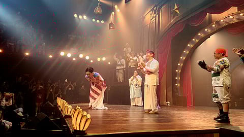 
Actor Lance Reblando waves and drapes on herself a transgender pride flag and becomes emotional during the curtain call.
