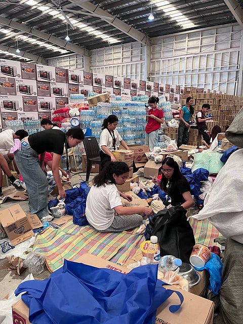 Race vs time Repacking of relief goods and other emergency items is stepped up at the Cebu Provincial Capitol warehouse to promptly deliver essential commodities to the towns in northern Cebu severely affected by the 6.9-magnitude earthquake.