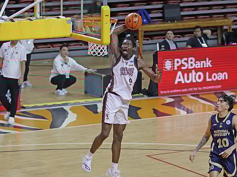 
Francis Nnoruka goes wild, hitting 14 points and grabbing six rebounds in UP’s 66-59 victory over erstwhile unbeaten NU on Saturday in UAAP Season 88 men’s basketball tournament at the UST Quadricentennial Pavilion.