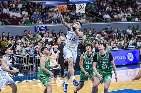 
Dom Escobar shoots 15 points and grabs nine rebounds to lead Ateneo to an 81-74 upset win over La Salle in their UAAP Season 88 men’s basketball tournament game on Sunday at the Mall of Asia Arena.