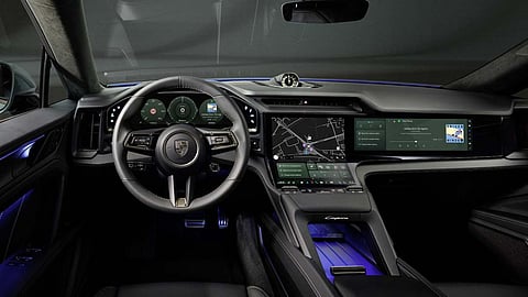 
THE Porsche Cayenne Electric features a wide curved OLED display that stretches across the dashboard.