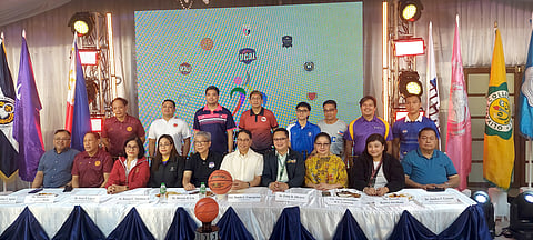 
DANILO Concepcion (seated, sixth from left), president of host Centro Escolar University, and other members of the board of trustees and basketball coaches of the Universities and Colleges Athletic League express excitement over the opening of their eighth season on Thursday.   
