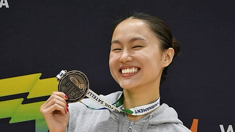 
Maxine Esteban proudly displays her latest hardware — a bronze medal she won in the FIE Tournoi Satellite World Cup in Rio de Janeiro, Brazil. 