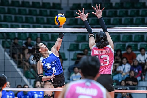 

JOVELYN Gonzaga of Zus Coffee scores over the defense of Celine Domingo of Akari in the opening salvo of the PVL Reinforced Conference on Tuesday at the Ynares Center in Montalban, Rizal. The Thunderbelles won, 24-26, 25-23, 17-25, 26-24, 15-7.