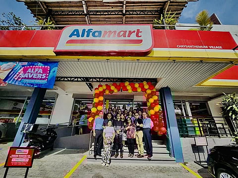 STORE opening in Chrysanthemum Village in San Pedro, Laguna with Alfamart COO Harvey Ong and Engr. Leovino Datario, the first franchisee of Alfamart, and wife Doris Datario.