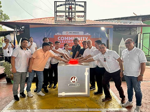 Partnerships for electrification. One Meralco Foundation, led by its president Jeffrey O. Tarayao (4th from right), brought its Household Electrification Program to low-income homes in Norzagaray, Bulacan, led by Mayor Elena L. Germar represented by former Mayor Alfredo Germar (middle, in black), with the help of Meralco, represented by Home & Micro Business-North Business Area Head Alleni O. Pascual (7th from right), North Distribution Services head Sante C. Buella (3rd from right), Plaridel Sector head Noel L. Espiritu (second from right) and Sta. Maria Business Center Head Reginald P. Romano (8th from right).
